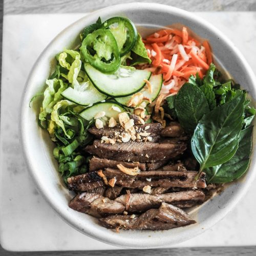 Delicious Vietnamese beef salad bowl with fresh vegetables and herbs in San Jose.